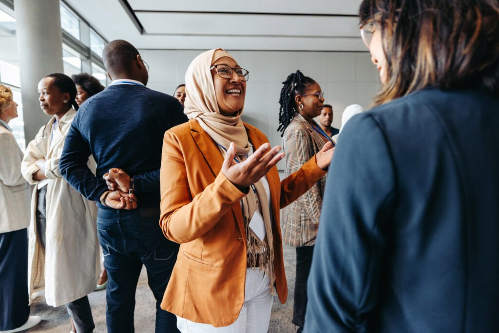 People mingling and chatting at a conference