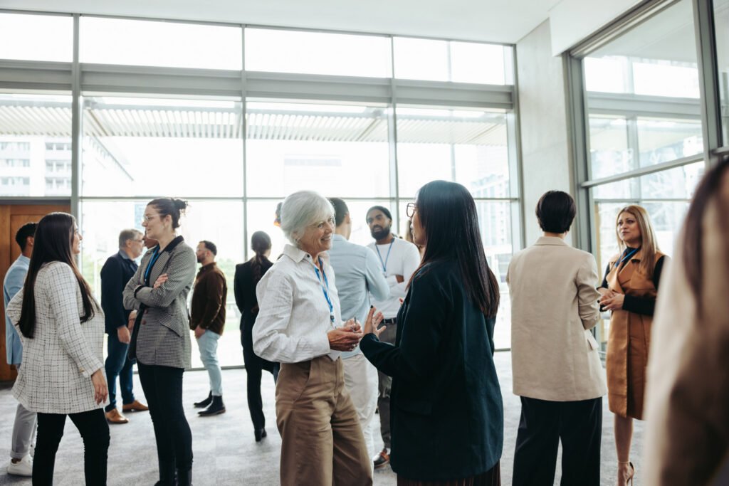 Future employees at a networking event talking
