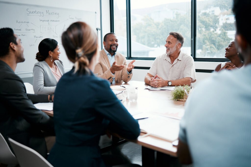 A group of coworkers talking in a meeting