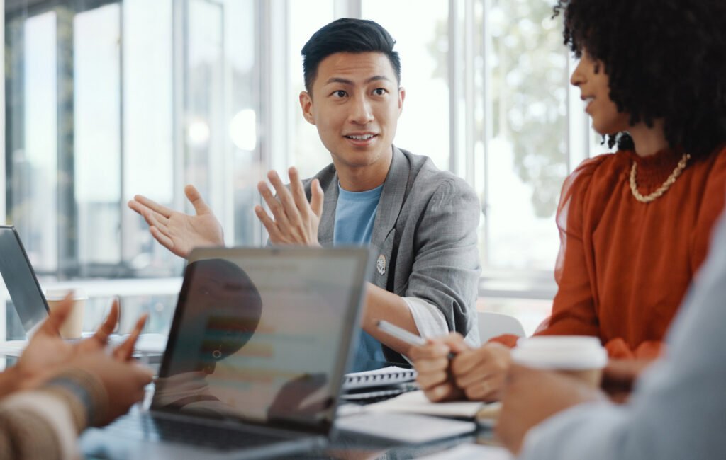 An employer talking at a meeting