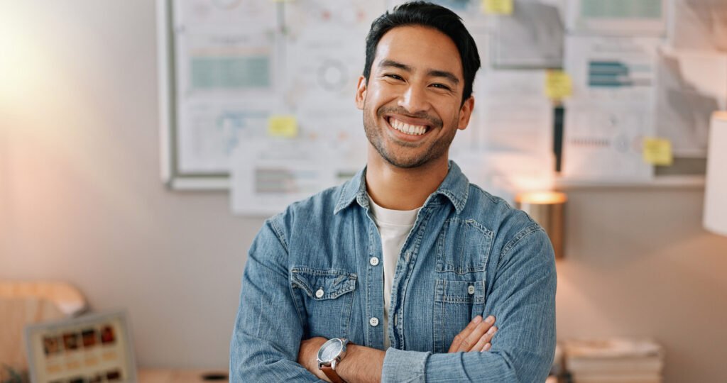 A smiling employee in their office