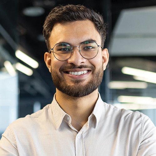 An employee smiling