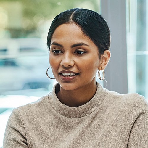 Headshot of an employee smiling