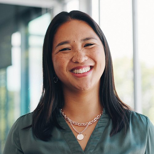 Headshot of a smiling employee